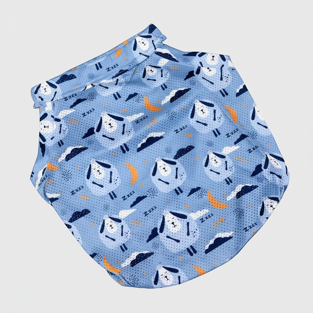 Frenchie Family Co. blue dog vest with sleeping sheep, clouds, and moons pattern. Breathable mesh for summer.